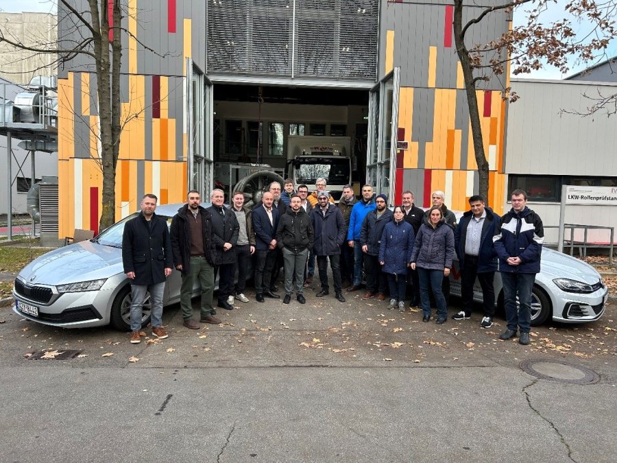 VERA consortium participants with the project's light-duty and heavy-duty vehicles.